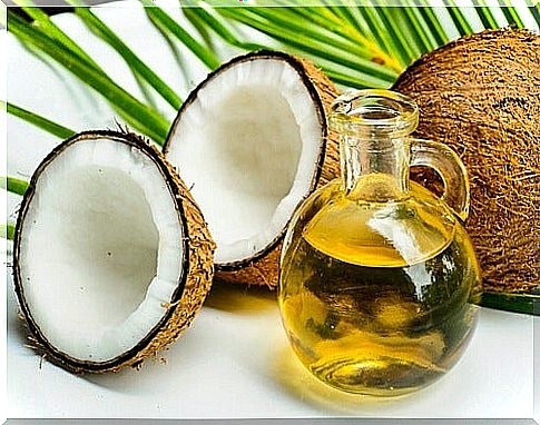 Open coconut and coconut oil in the bottle