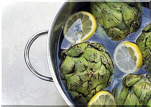 Boil the artichokes in water