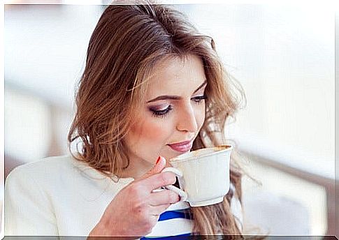 Woman enjoys coffee